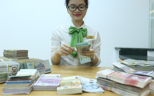 Tỉ giá USD/VND và ám ảnh phá giá Nhân dân tệ 3 năm trước - Ảnh 1.