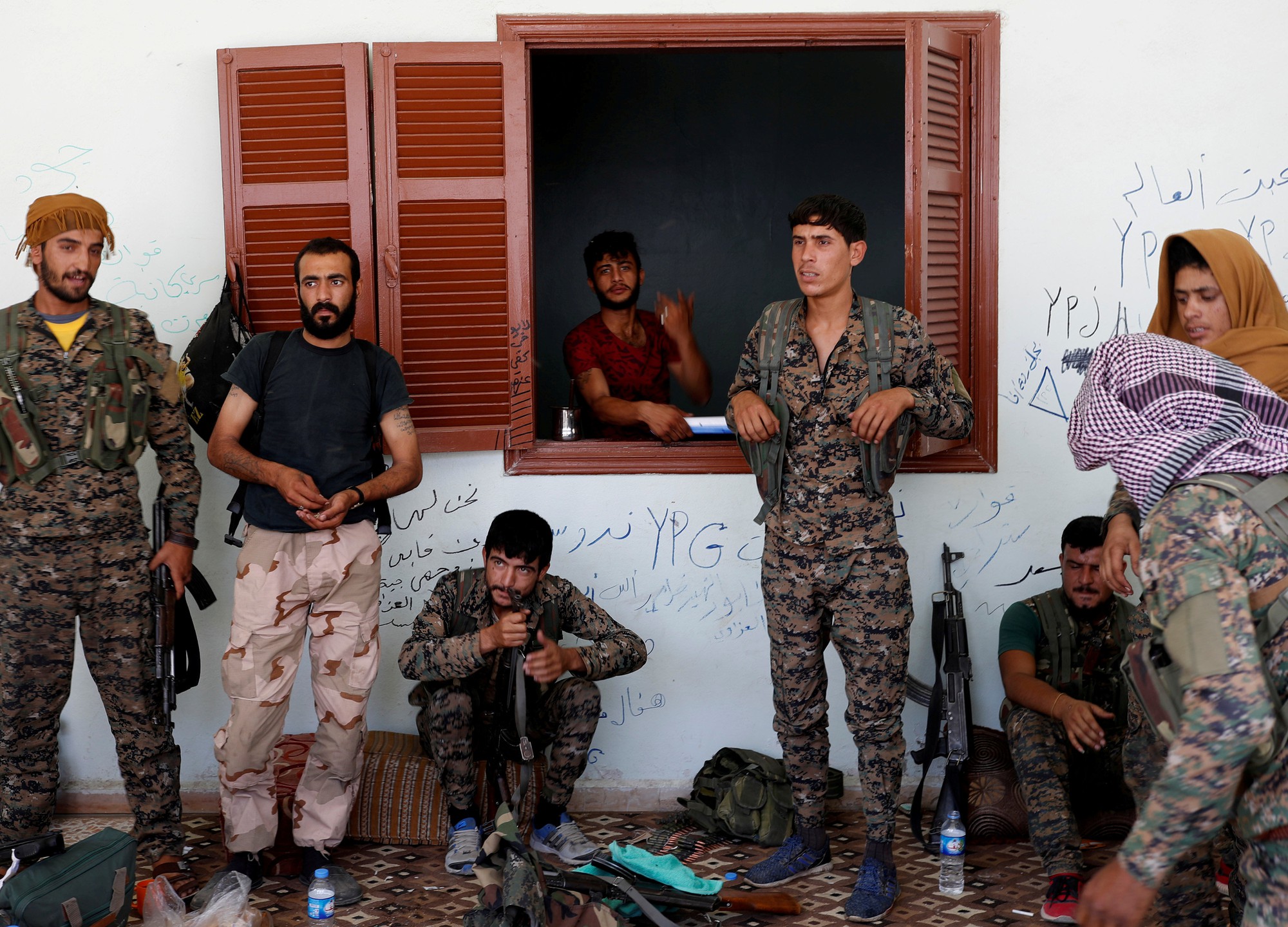 Cảnh giác với Mỹ, người Kurd tìm đến chính phủ Syria