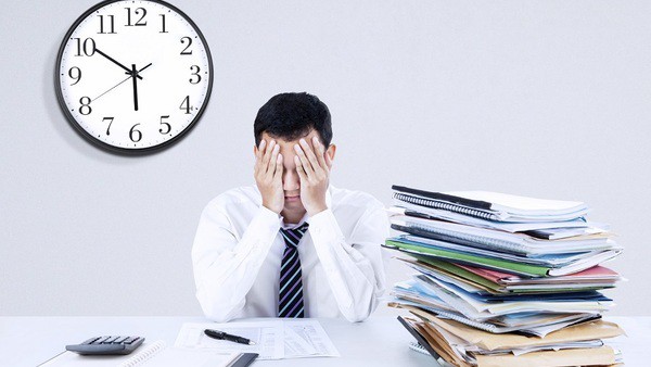 Trả lương làm thêm giờ cho người lao động - Ảnh 1.