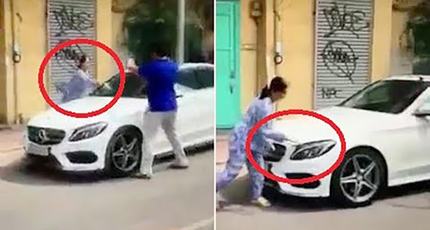 Bị thách thức, người phụ nữ dùng búa đập xe sang đậu trước nhà