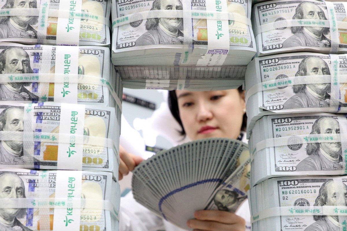 Các siêu cường đe dọa vị thế đồng USD