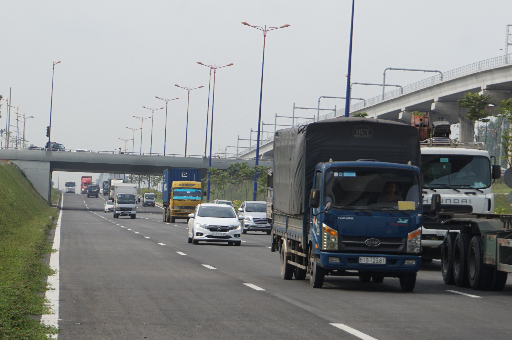 Th&ocirc;ng xe n&uacute;t giao Đại học Quốc gia TP HCM, cửa ng&otilde; ph&iacute;a Đ&ocirc;ng rộng mở - Ảnh 4.