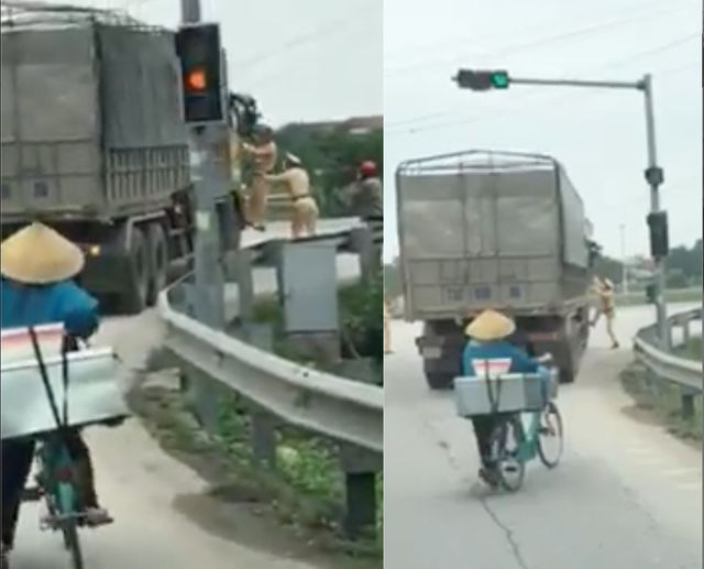 Clip: T&agrave;i xế xe tải nhấn ga bỏ chạy, 2 CSGT đu b&aacute;m tr&ecirc;n cửa cabin - Ảnh 1.
