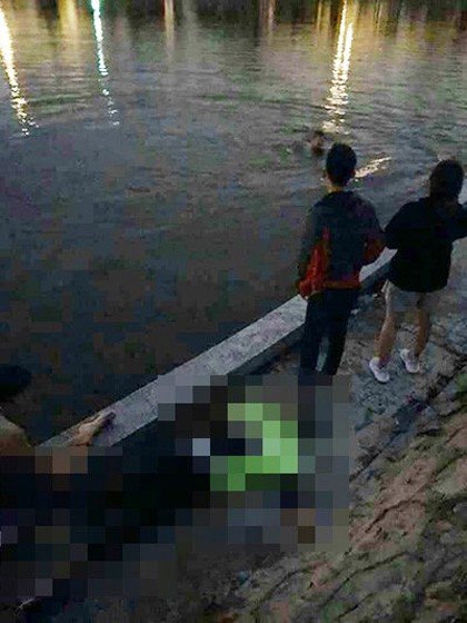 Đ&ocirc;i nam nữ c&atilde;i v&atilde; rồi nhảy xuống hồ điều h&ograve;a, 1 người tử vong - Ảnh 1.