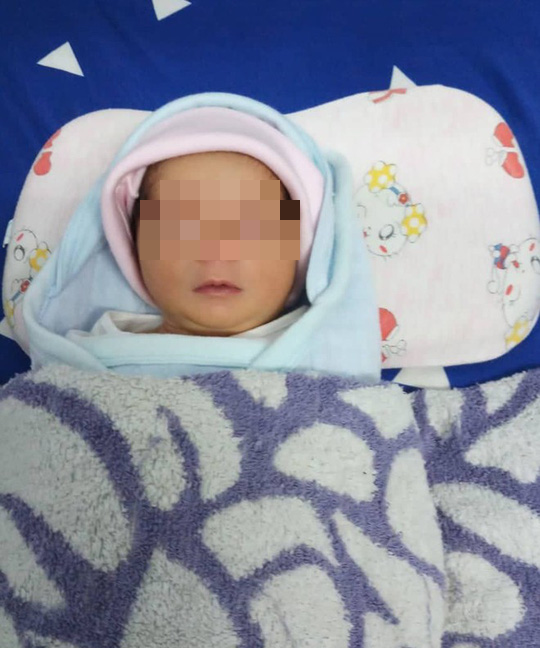 Nữ chủ tịch phường “khó xử” vì bị đòi lại con nuôi - Ảnh 1.