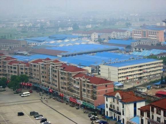 Ngắm ng&ocirc;i l&agrave;ng gi&agrave;u c&oacute; nhất Trung Quốc - Ảnh 2.