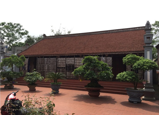 Trầm trồ trước vẻ đẹp của ngôi nhà gỗ mít độc nhất nhì đất Hà thành - Ảnh 1.