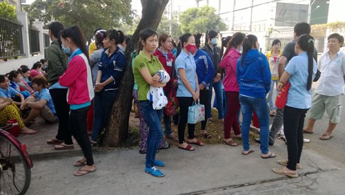 Khống chế số giờ làm thêm - Ảnh 1.