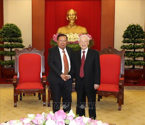 Tổng B&iacute; thư, Chủ tịch nước Nguyễn Ph&uacute; Trọng tiếp Tổng B&iacute; thư, Chủ tịch nước L&agrave;o - Ảnh 1.