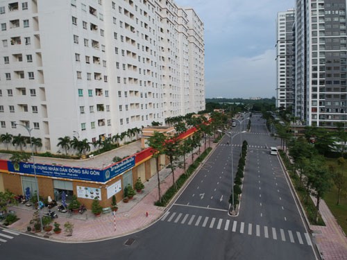 Có thể cho người dân đấu giá căn hộ tái định cư - Ảnh 1.