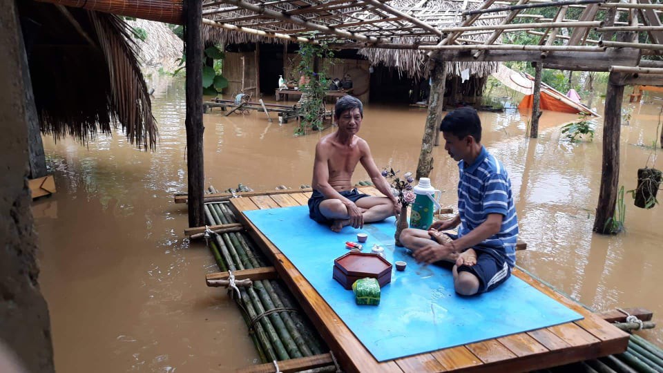 Một vùng rộng lớn ở Đồng Nai đang chìm trong nước, có nơi lút đầu trẻ - Ảnh 9.