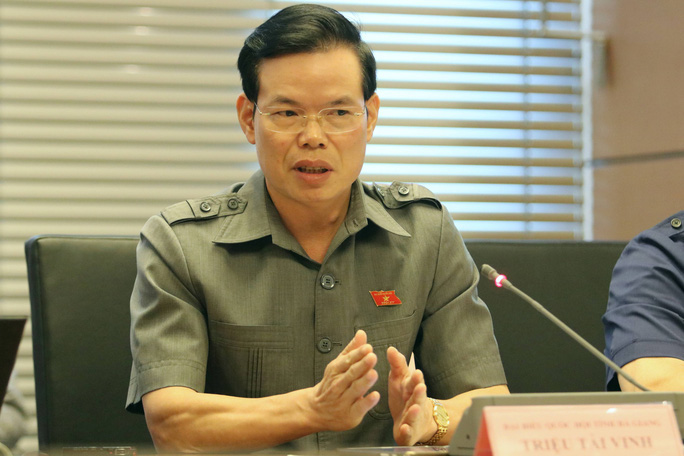 Cảnh cáo ông Hoàng Trung Hải, khiển trách ông Triệu Tài Vinh - Ảnh 1.