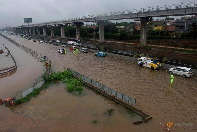 Jakarta: Mưa không bình thường một đêm, 16 người chết - Ảnh 10.
