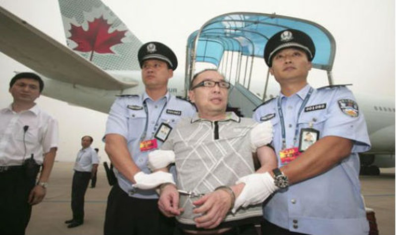 Mỹ: 8 người li&ecirc;n quan &ldquo;Chiến dịch Săn c&aacute;o&rdquo; của Trung Quốc th&agrave;nh kẻ bị săn - Ảnh 2.