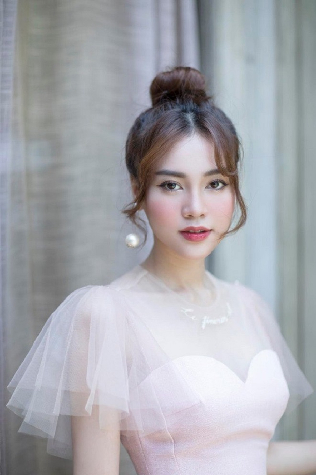 4 kiểu t&oacute;c gi&uacute;p chị em ăn gian chiều cao hiệu quả - Ảnh 4.