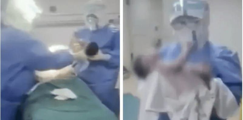 Bác sĩ đẫm mồ hôi mổ bắt con cho sản phụ nghi nhiễm virus corona