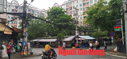 X&aacute;c định ca nhiễm Covid-19 thứ 48: Phong tỏa chung cư H&ograve;a B&igrave;nh ở TP HCM - Ảnh 10.