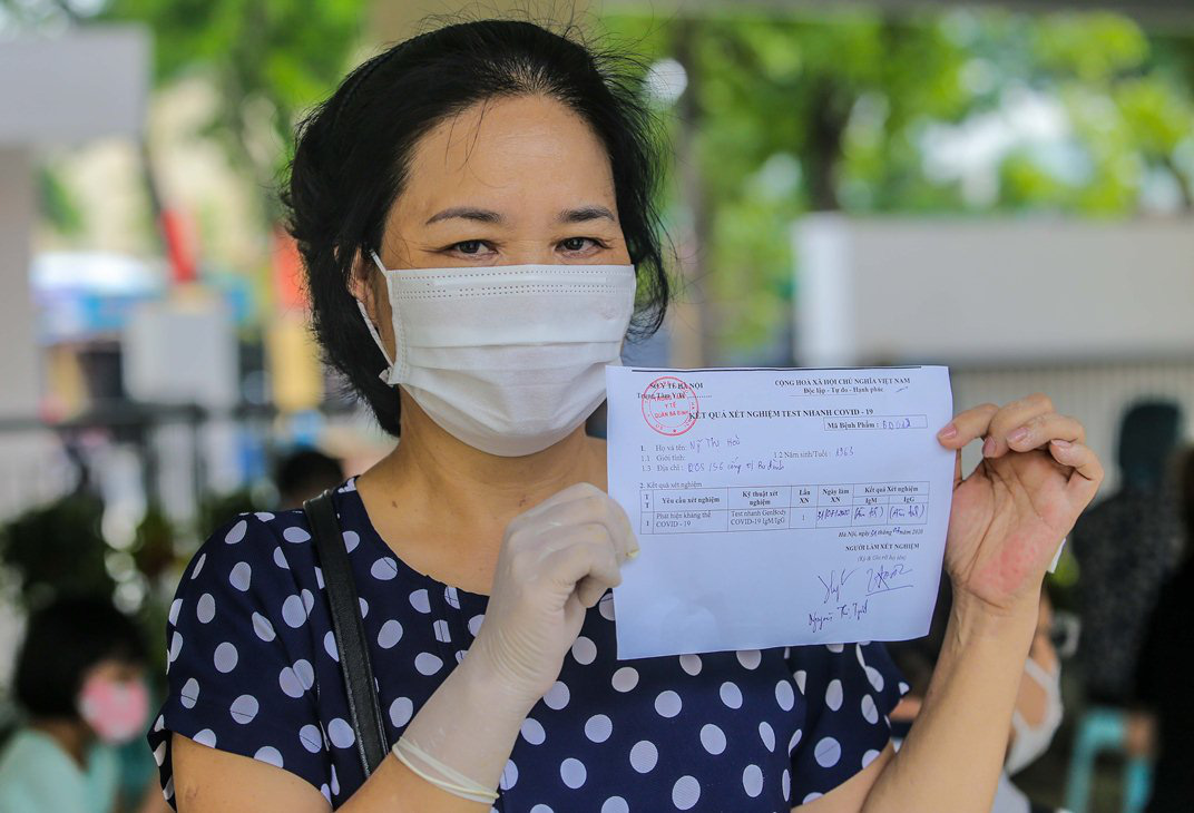 Hà Nội xét nghiệm nhanh Covid-19 cho người dân đi từ Đà Nẵng về - Ảnh 15.