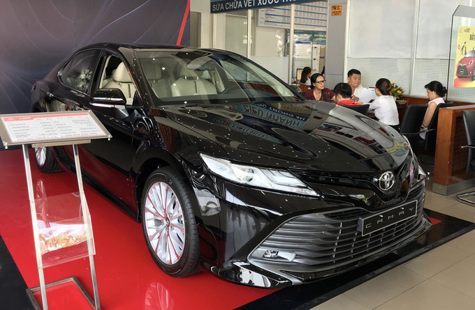 Muôn kiểu ép khách mua xe của đại lý ôtô - Ảnh 1.