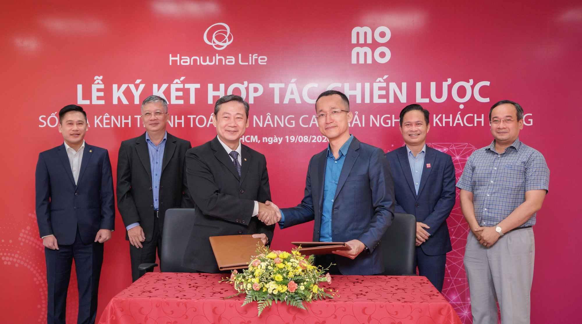 Hanwha Life Việt Nam hợp t&aacute;c chiến lược c&ugrave;ng MoMo v&agrave; Payoo - Ảnh 2.