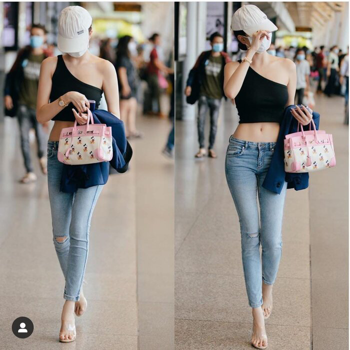 Ngọc Trinh làm náo loạn sân bay với kiểu áo thách thức ánh nhìn - Ảnh 5.