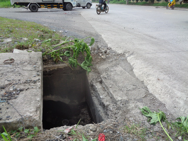 Hố ga nguy hiểm - Ảnh 1.