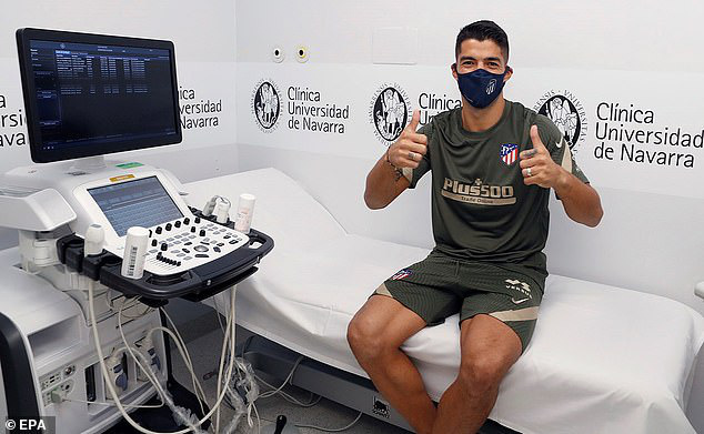 Những h&igrave;nh ảnh đầu ti&ecirc;n của Luis Suarez ở đội b&oacute;ng mới Atletico Madrid - Ảnh 10.