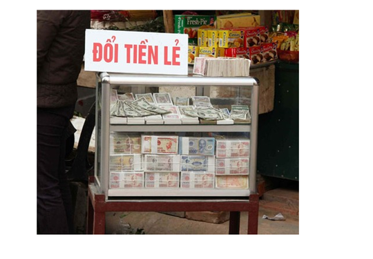 Đổi tiền lẻ kiếm lời trong ngày Tết có bị xử phạt?