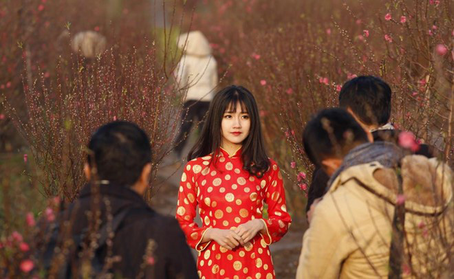 Câu hỏi kém duyên dịp tết: Chống trả quyết liệt hay cười ...cho xong? - Ảnh 1.