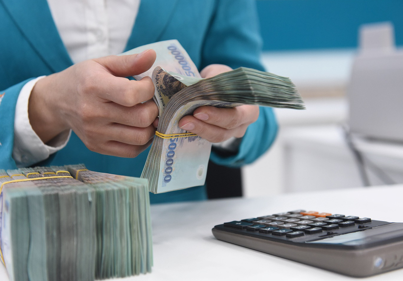 Ngân hàng đã "hi sinh" bao nhiêu tiền lãi cho khách hàng bị ảnh hưởng bởi Covid-19?