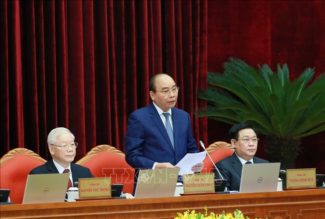 Chủ tịch nước Nguyễn Xu&acirc;n Ph&uacute;c điều h&agrave;nh phi&ecirc;n khai mạc Hội nghị Trung ương 4 - Ảnh 1.