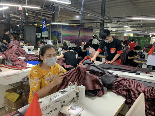 Tạo việc l&agrave;m cho lao động hồi hương - Ảnh 1.