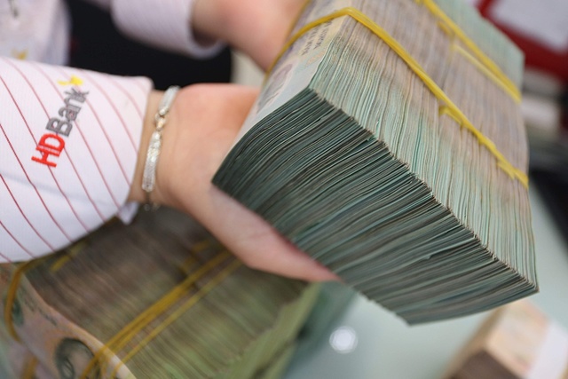 Ng&acirc;n h&agrave;ng đua tăng vốn - Ảnh 1.