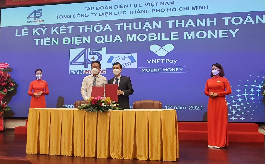 EVNHCMC ký kết thanh toán tiền điện không dùng tiền mặt qua Mobile Money - Ảnh 3.