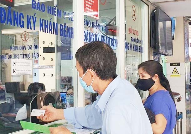 Xây dựng gói quyền lợi cho người tham gia BHYT - Ảnh 1.