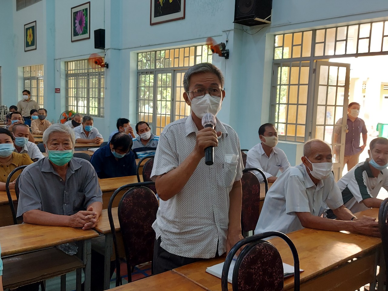 Đeo b&aacute;m, giải quyết c&oacute; hiệu quả kiến nghị của cử tri, người lao động - Ảnh 1.