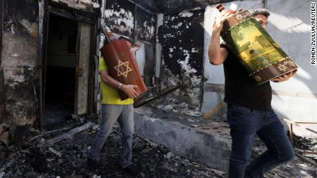 Hamas phóng rốc-két trả thù vụ Israel không kích chết gia đình 10 người Palestine - Ảnh 4.