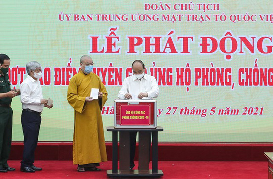 Chủ tịch nước Nguyễn Xu&acirc;n Ph&uacute;c k&ecirc;u gọi đ&oacute;ng g&oacute;p ủng hộ để Việt Nam sớm chiến thắng Covid-19 - Ảnh 2.