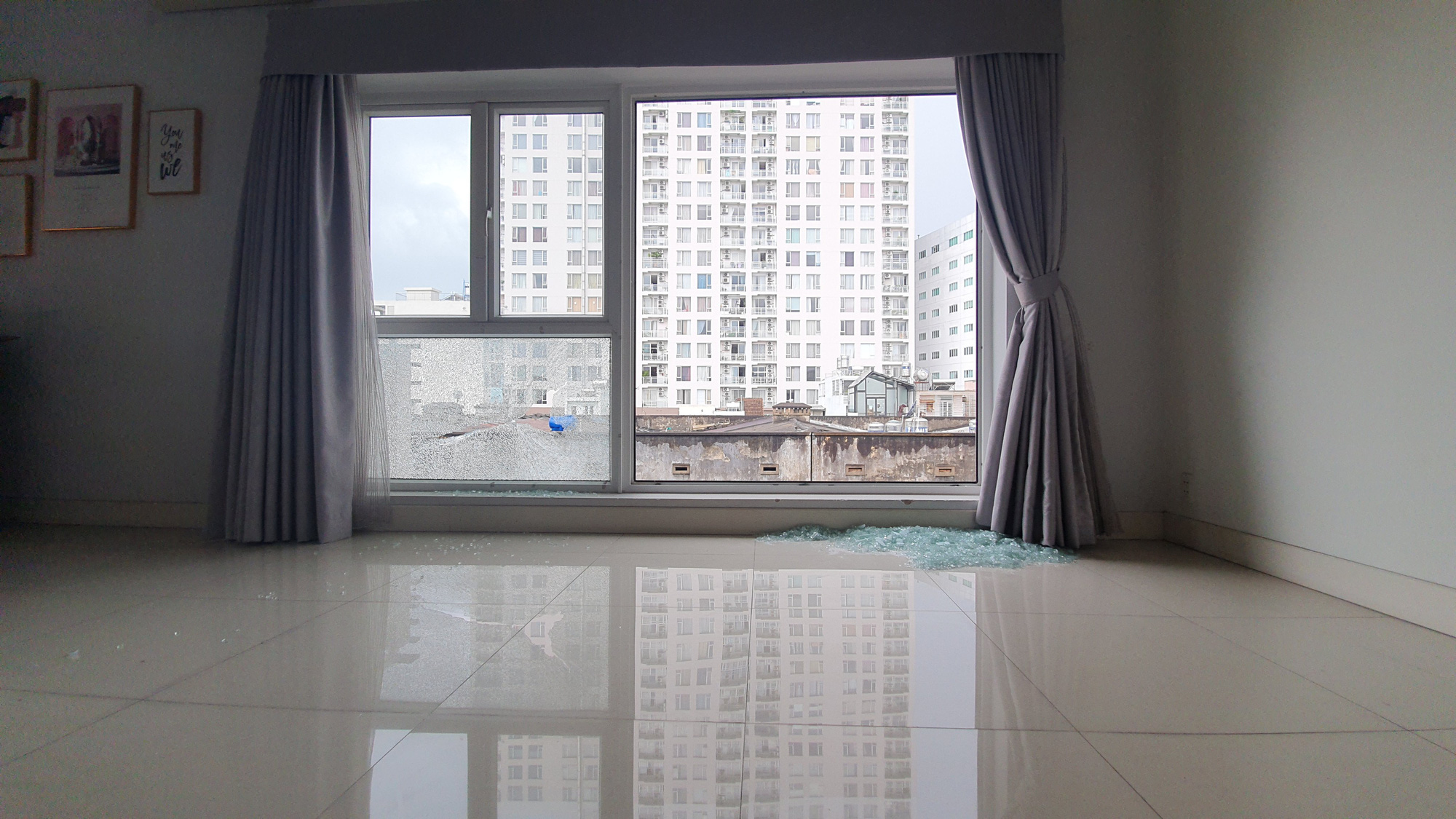 Lời khai của đối tượng nhiều lần bắn vỡ k&iacute;nh nh&agrave; d&acirc;n ở quận 1, TP HCM - Ảnh 1.