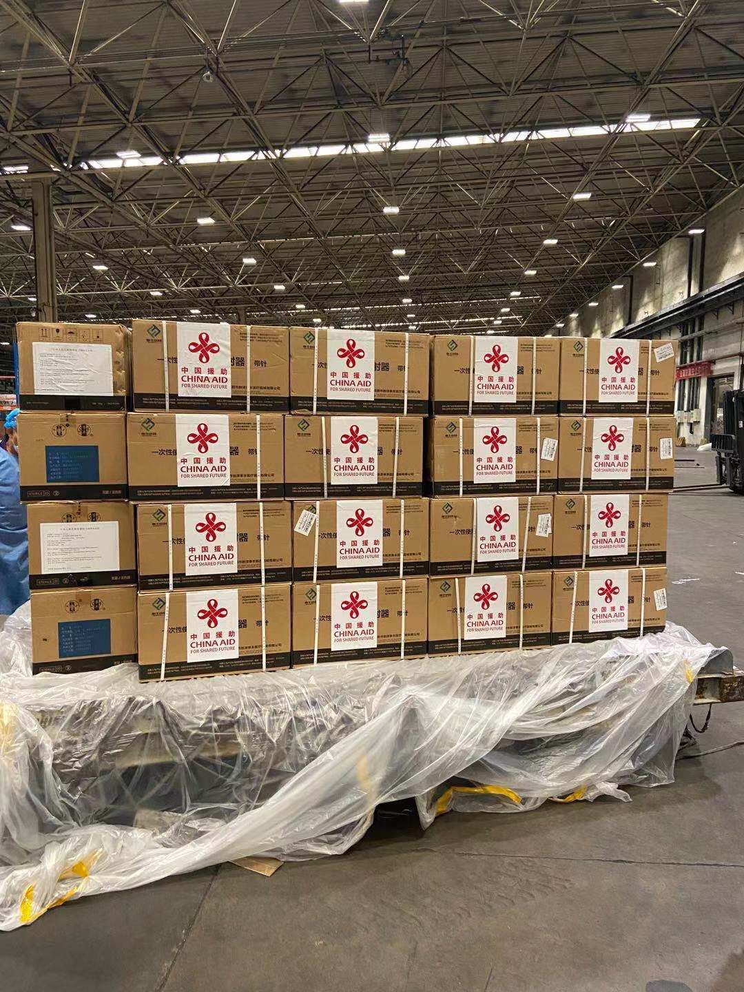 Lô 500.000 liều vắc-xin Covid-19 do Trung Quốc viện trợ về Hà Nội - Ảnh 10.