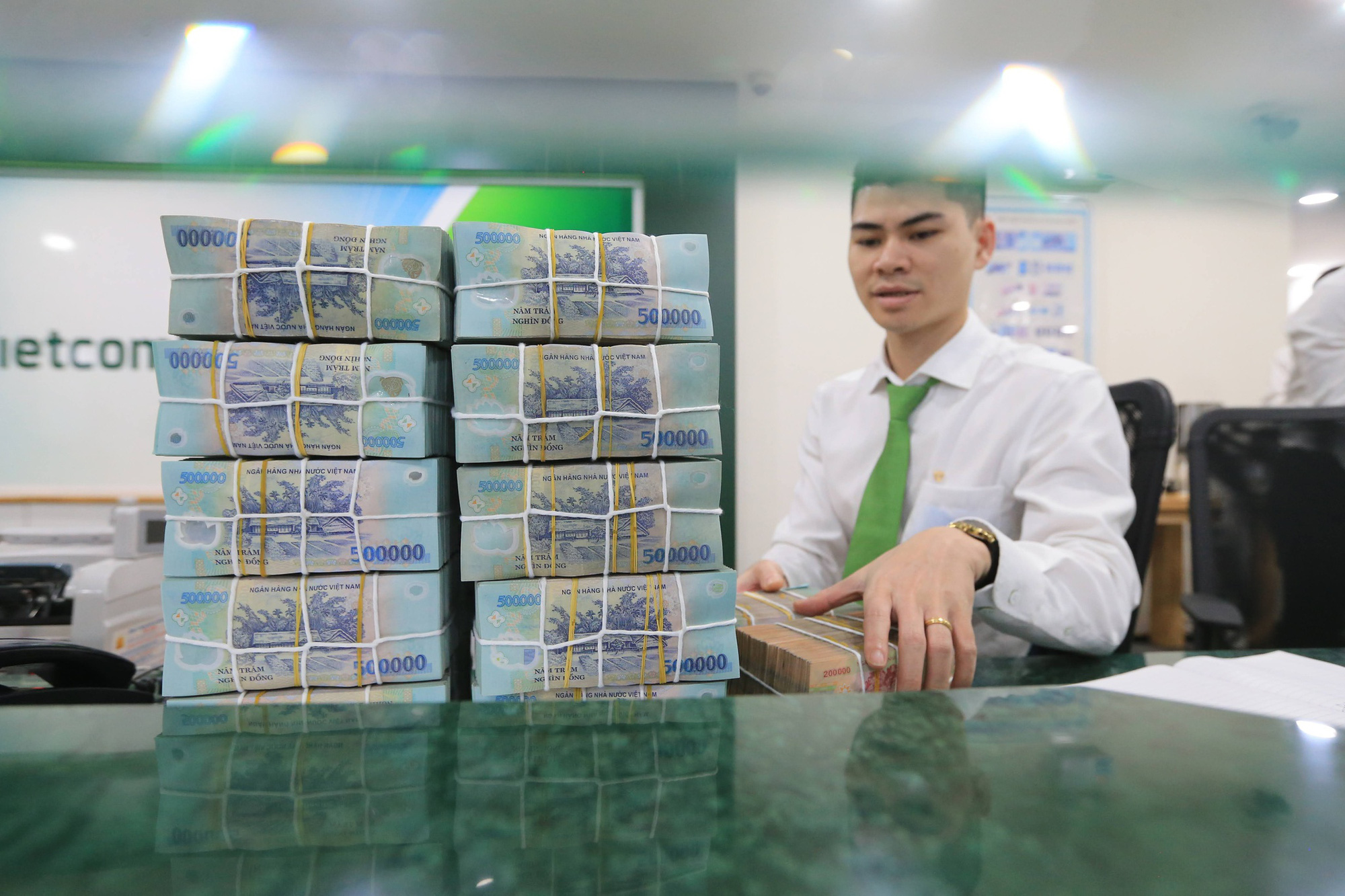 Ngân hàng thừa tiền, doanh nghiệp vẫn đói vốn - Ảnh 1.