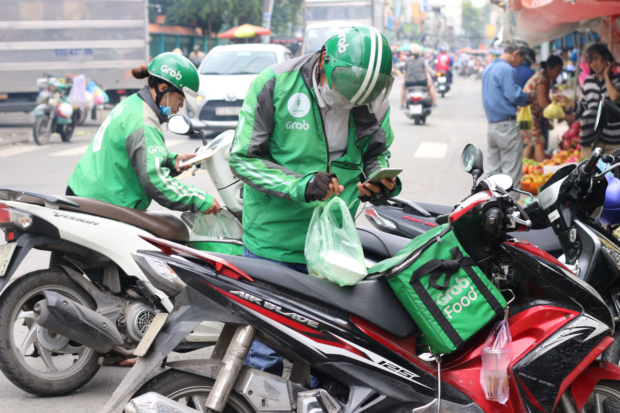 Th&agrave;nh phố Hồ Ch&iacute; Minh dự ki&ecirc;́n mở r&ocirc;̣ng h&ocirc;̃ trợ đ&ocirc;́i tượng lao động tự do gặp kh&oacute; khăn - Ảnh 2.