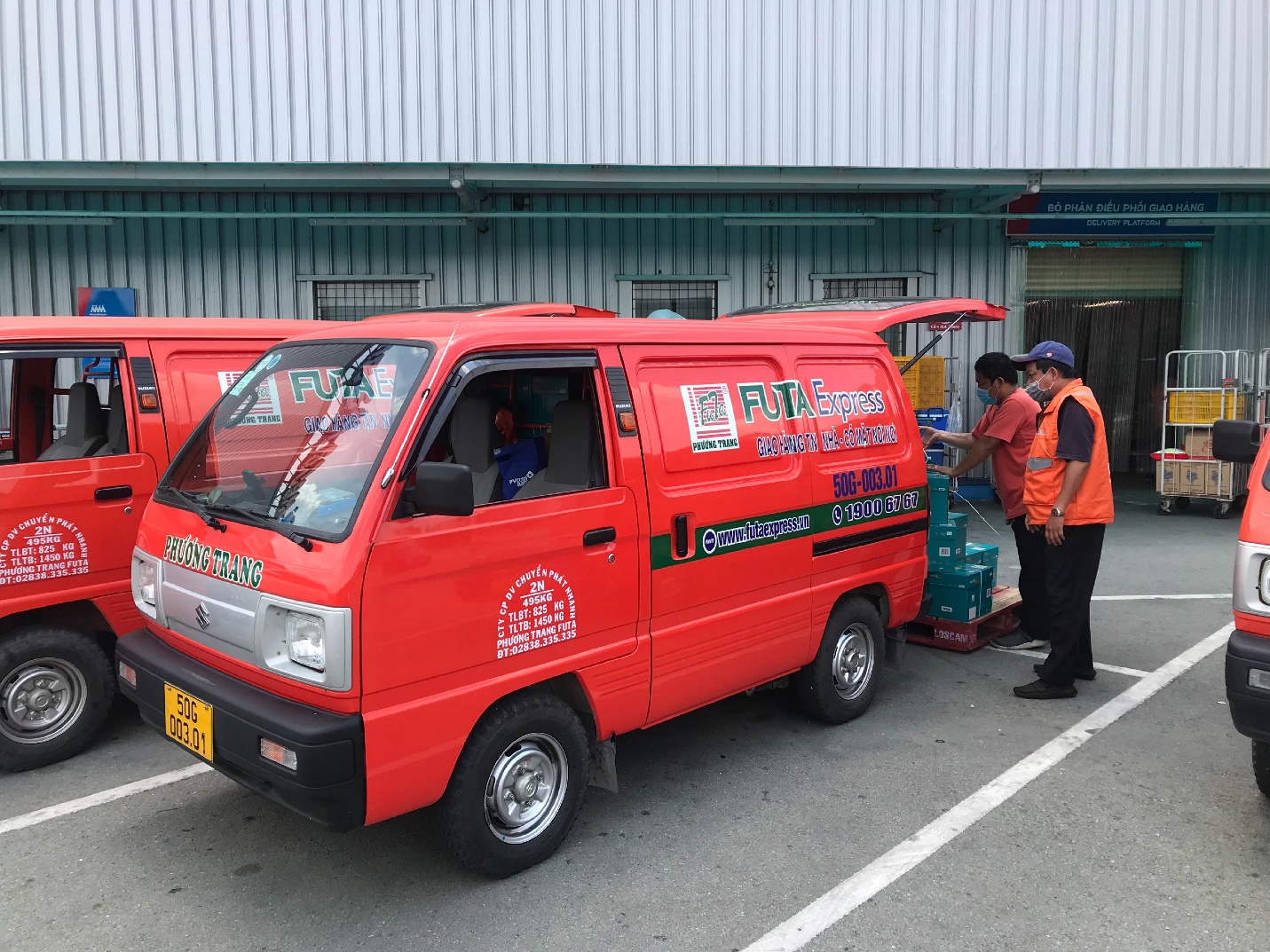 Doanh nghiệp vận tải hàng hóa vượt khó mùa dịch, kiên trì phục vụ người dân - Ảnh 2.