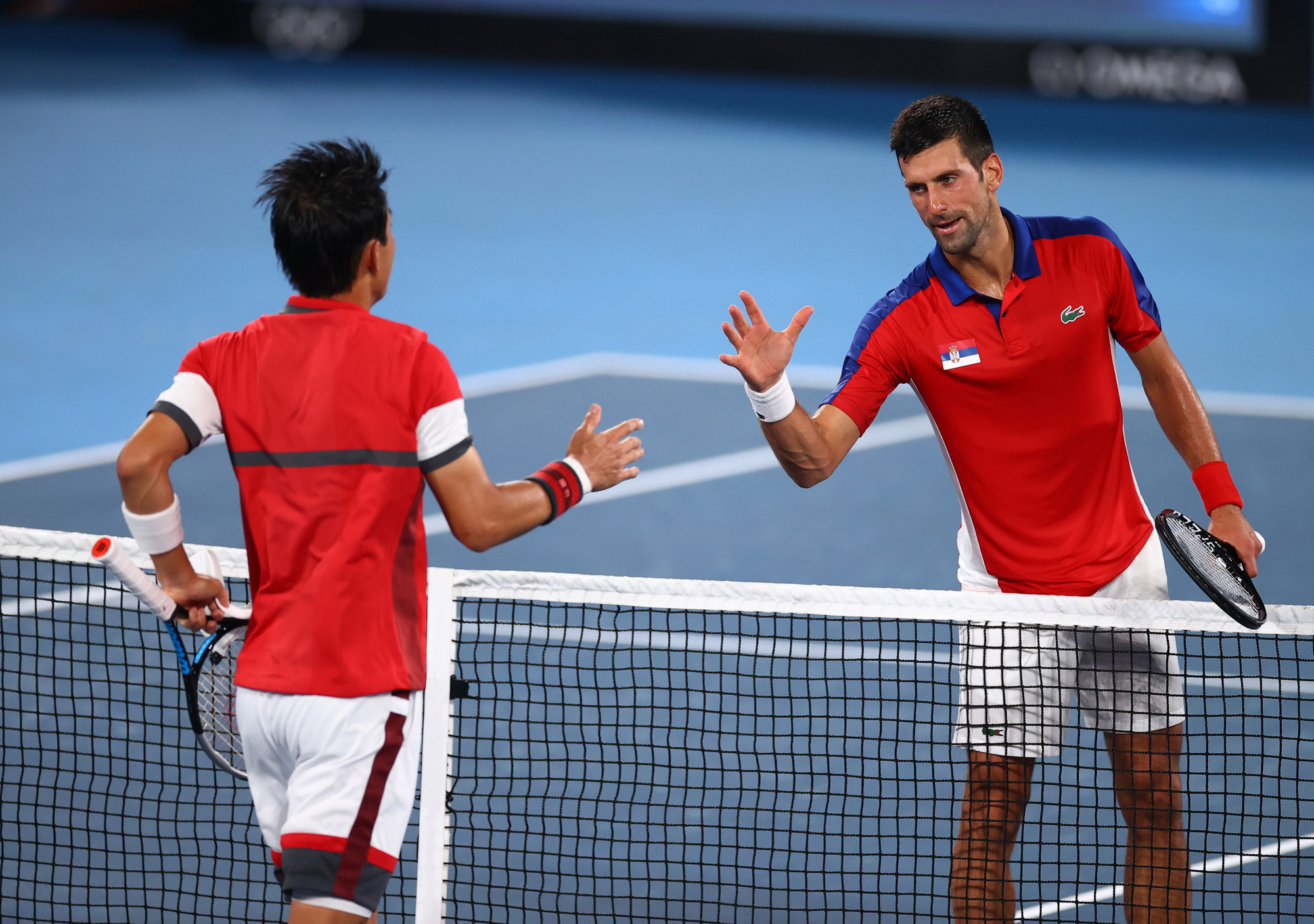 Olympic Tokyo 2020: Hạ tay vợt nước chủ nh&agrave;, Djokovic tiến gần đến danh hiệu Golden Slam - Ảnh 5.