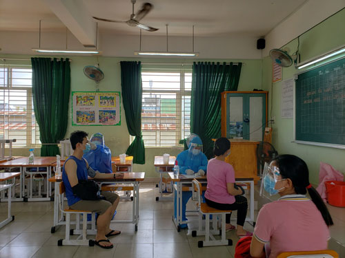 Đẩy nhanh tiến độ bao phủ vắc-xin - Ảnh 1.