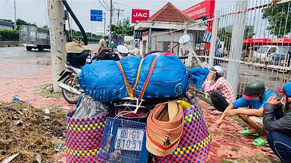 Nghe tin TP HCM nới lỏng, người d&acirc;n k&eacute;o về qu&ecirc; nhưng phải quay trở lại - Ảnh 3.