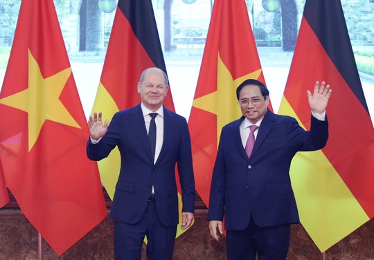 Cận cảnh Thủ tướng Phạm Minh Chính đón Thủ tướng Đức Olaf Scholz - Ảnh 13.