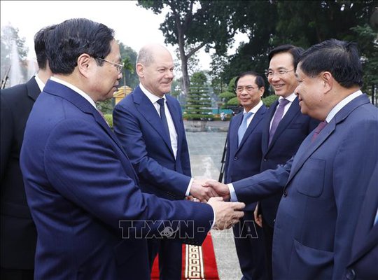 Cận cảnh Thủ tướng Phạm Minh Chính đón Thủ tướng Đức Olaf Scholz - Ảnh 9.
