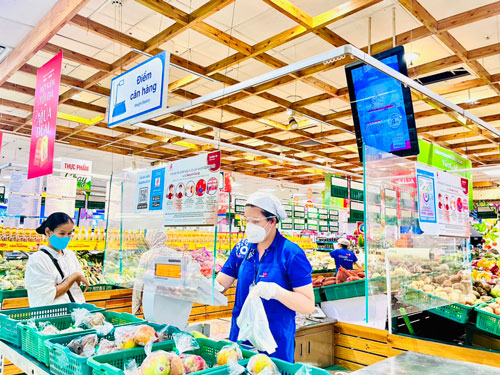 Lương lao động thời vụ tăng 300.000-400.000 đồng/tháng - Ảnh 1.