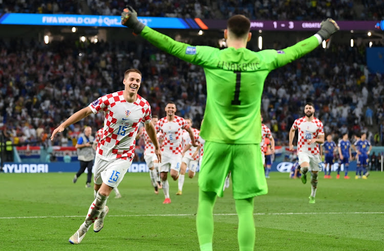 Người nhện Croatia l&agrave;m tan n&aacute;t c&otilde;i l&ograve;ng CĐV Nhật Bản - Ảnh 4.